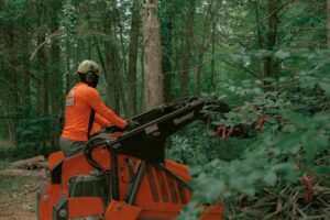 Walnut Tree Service employee working on machine