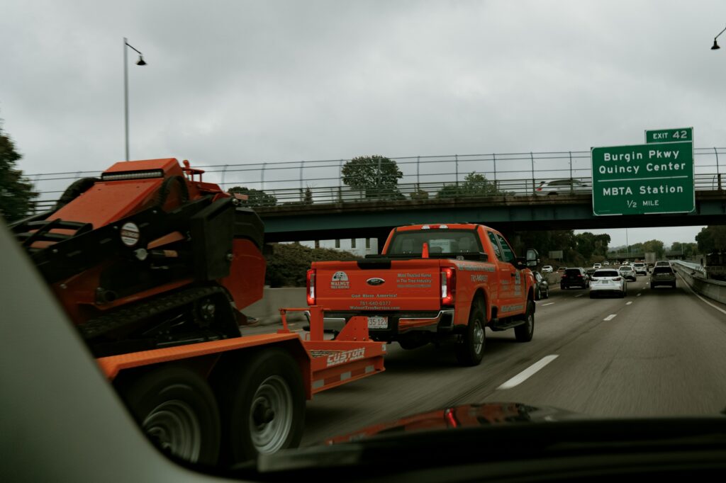 Walnut Tree Services truck on the freeway.